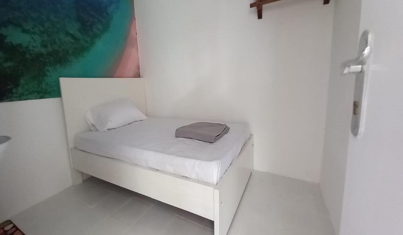 Oyo 90974 Homestay Golo Koe Sejahtera Лабуан-Бахо Экстерьер фото